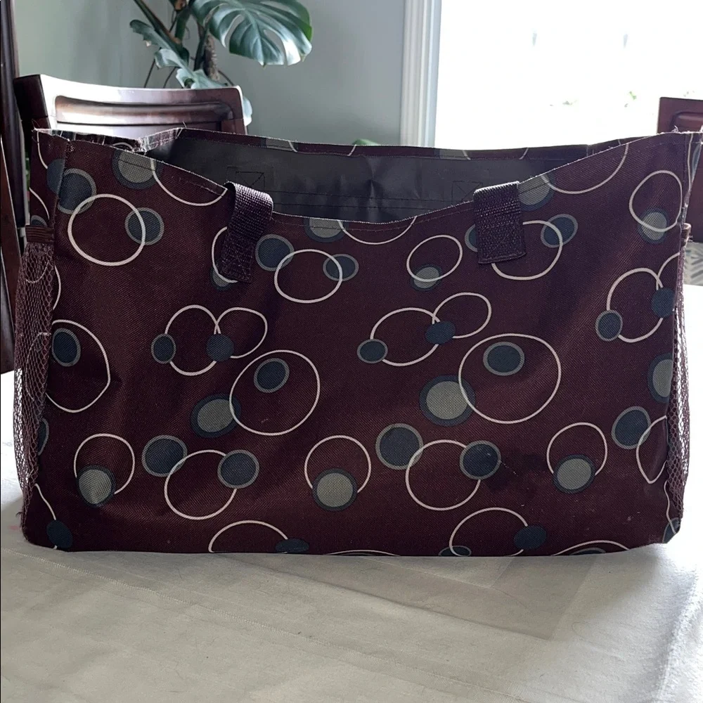 All purpose Brown Polka Dot Vinyl Tote Bag Open at top with side pockets.